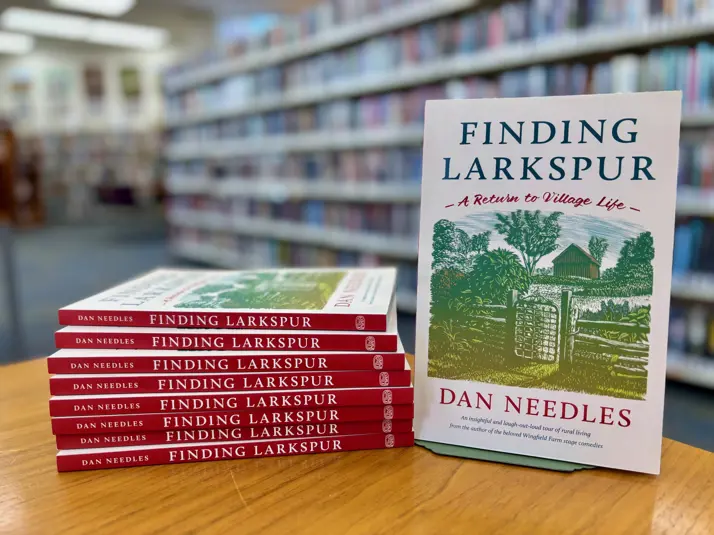 stack of Finding Larkspur on shelves in library